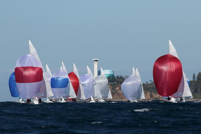 Magpie (Red and white spinnaker) bring the fleet back down to the leeward mark. - 2017 Line 7 Etchells Australasian Championship ©  Alex McKinnon Photography http://www.alexmckinnonphotography.com